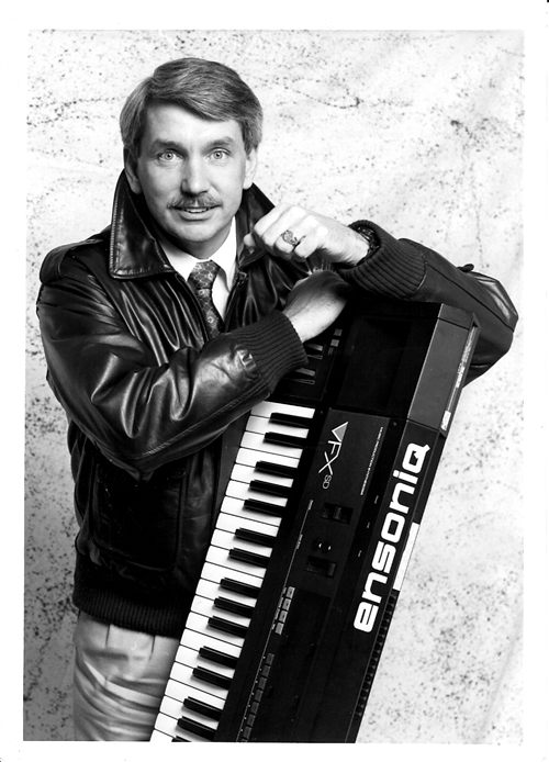 Dan Garrett with an Ensoniq VFX-SD synthesizer, mid-1980s